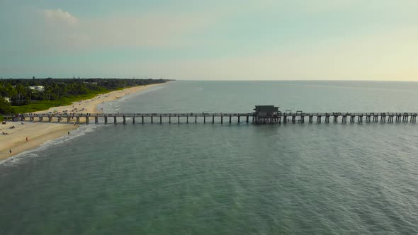 Naples Beach and Fishing Pier at Sunset, Florida.