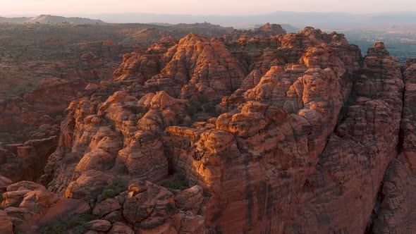 Tilting aerial shot showing the depth and character of Utah's ancient lava flow mountains.