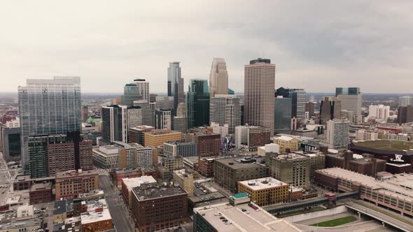 push in aerial drone shot of downtown minneapolis in minnesota