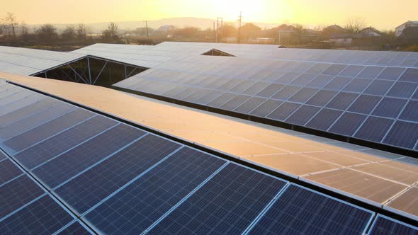 Aerial View of Large Sustainable Electrical Power Plant with Rows of Solar Photovoltaic Panels for