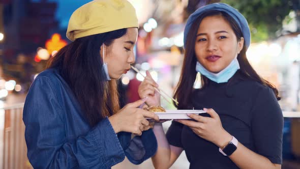 Traveler Asian blogger women travel in Bangkok, Thailand, woman  Eating Traditional Asian