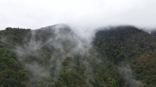 Mountains in Fog Slow Motion. Aerial View of the Carpathian Mountains in Autumn, Ukraine