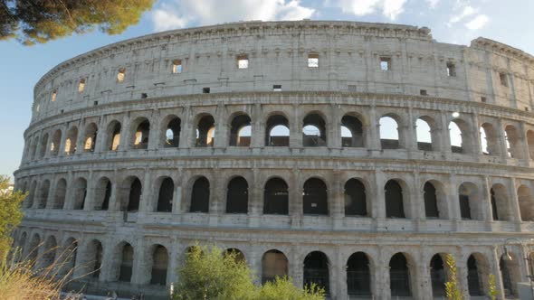 wide angle panning shot of the colosseum, rome