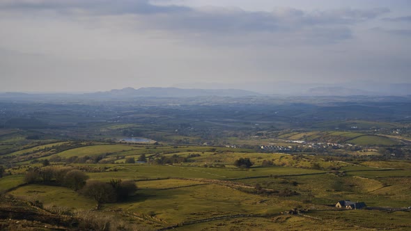 Time lapse of rural agricultural nature landscape during the day in Ireland.