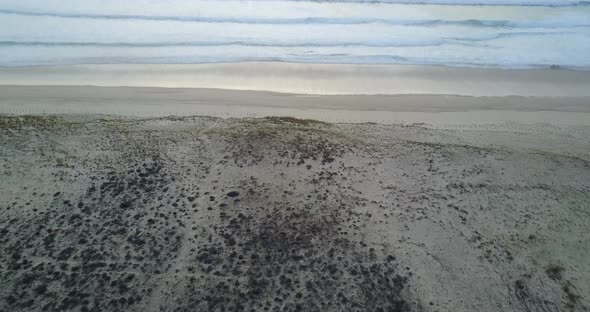 Tilt up from an Aerial shot above Mimizan beach