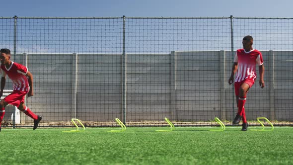 Soccer players training on field