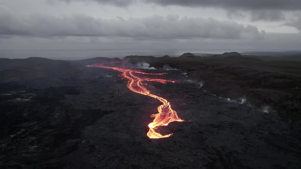 Drone Over Flowing River Of Molten Lava