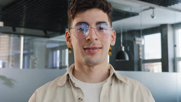 Portrait Closeup Young Caucasian Confident Guy with Glasses Student Manager Looking at Camera