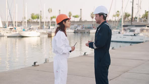 Two Employee Greeting Each Other at Yacht Club