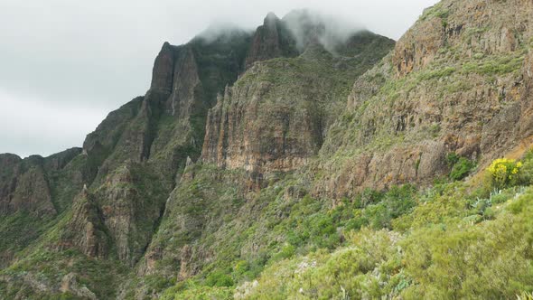 Cliffs in Masca with cloudy rolling around them, Teno, Tenerife, Spain.