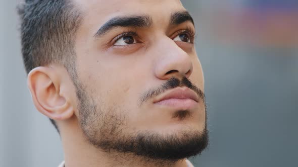 Closeup Human Serious Dreamy Male Face with Perfect Beard and Dark Eyes Hispanic Arab Man Bearded