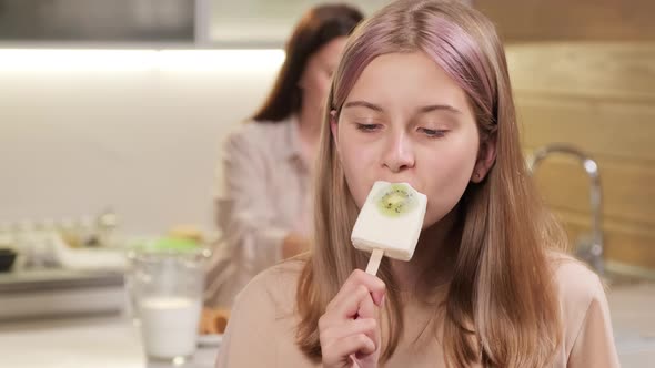 Portrait Of Girl Eating Ice-Cream