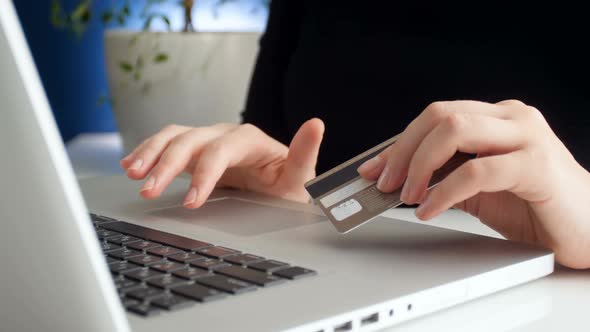 Footage of Woman Entering Credit Card Number While Doing Purchases at Online Store