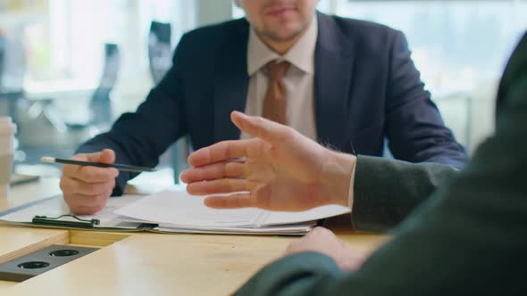 Business Partners Shaking Hands on Meeting