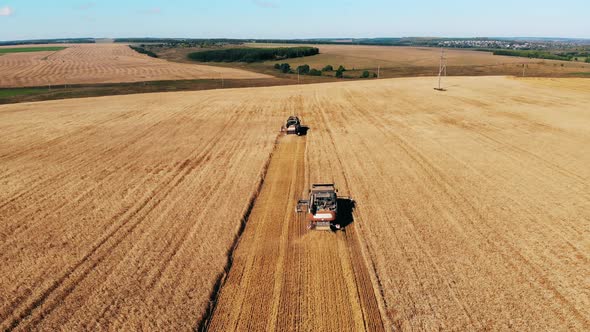 Plowing Machines Driving on a Farm