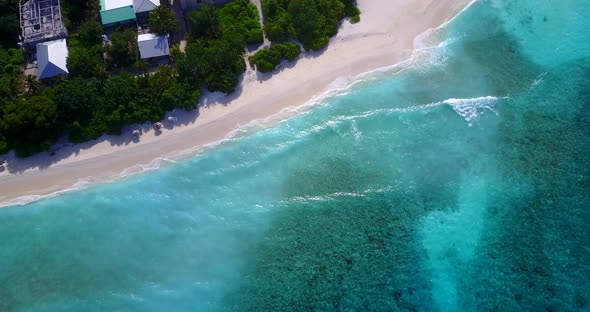 Luxury drone clean view of a sunshine white sandy paradise beach and aqua turquoise water background