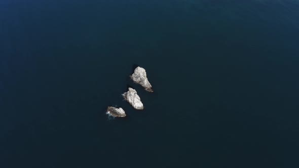 Drone View of the Sharp Cliffs in the Sea