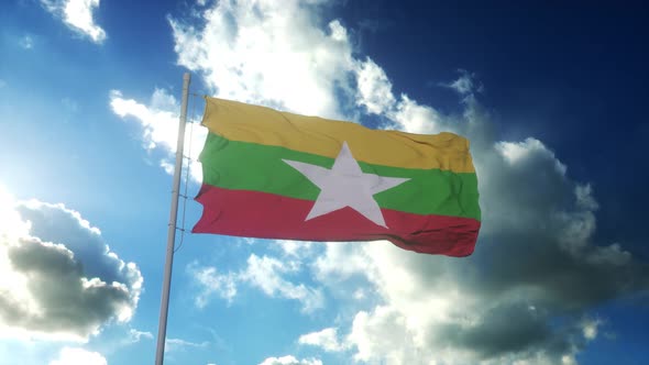 Flag of Myanmar Waving at Wind Against Beautiful Blue Sky