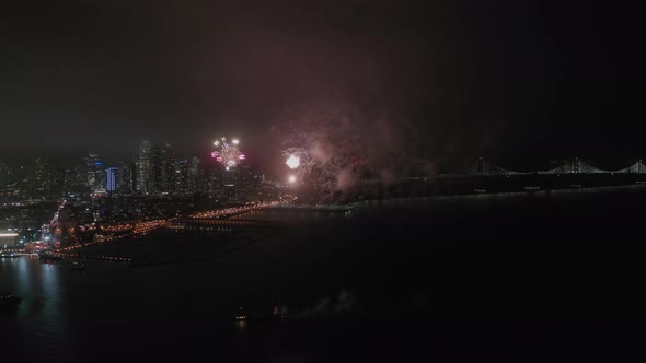 Aerial View Over the Fireworks in Dark Sky Over the Beautiful San Francisco Cityscape