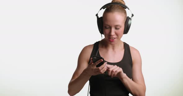Woman Listening to Music in Headphones