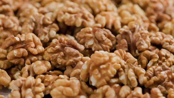 Looped Spinning Walnuts Without the Shell Closeup Full Frame Background