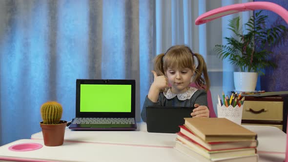 Preschool Child Girl Pupil Distance Online Learning at Home Listening Audio Lesson Doing Homework