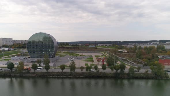 Aerial view of Modern building in the city in the form of a washer 15