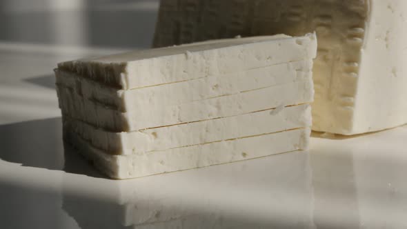 Stack of white cow milk cheese  4K footage