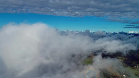 Above the clouds. Sunrise foggy morning.