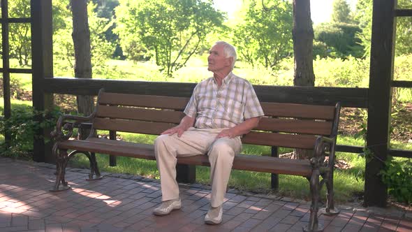 Old Man Sitting on Bench.