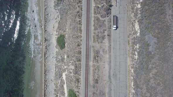 Aerial Drone Shot of Railway Next to the Ocean