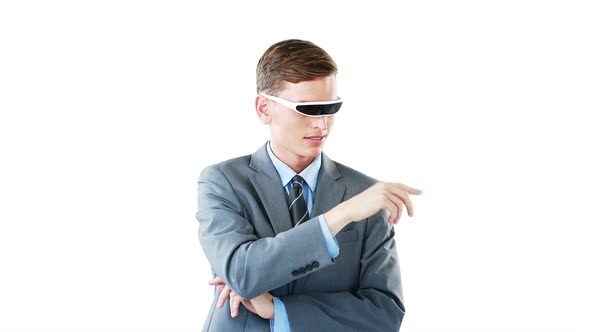 Businessman in virtual video glasses using digital screen