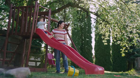 Caucasian Mother and Daughter on the Playground