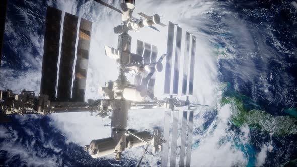 A View of the Earth and a Spaceship. ISS Is Orbiting the Earth alt