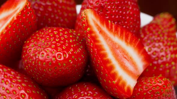 Strawberries close-up, macro. Berries rotate on their axis.