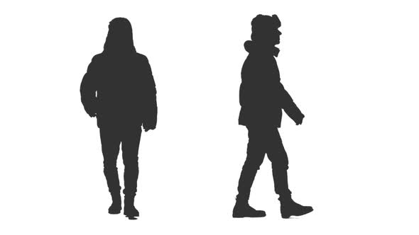 Male Silhouette Walks in Winter Clothes