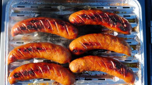 Sausages Grilling on Gas Grill