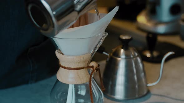 Process of making espresso in a coffee machine.