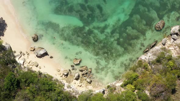 Macao Beach with Turquoise Water and Stone Cliff