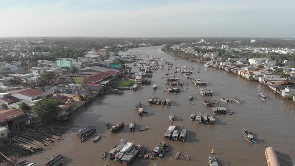 Aerial: flying over Cai Rang floating market in the morning, Can Tho, Vietnam