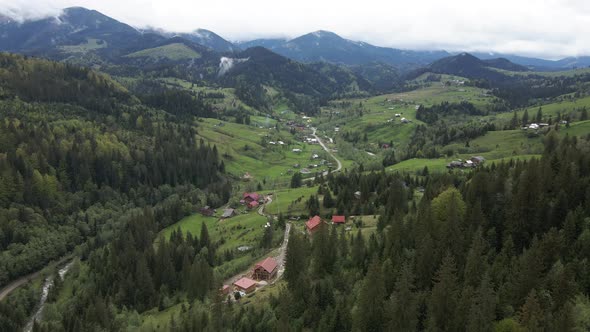 Village in the Mountains. Slow Motion. Carpathians. Ukraine. Aerial