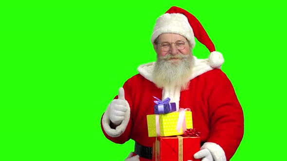 Santa Holding Gifts, Green Screen.