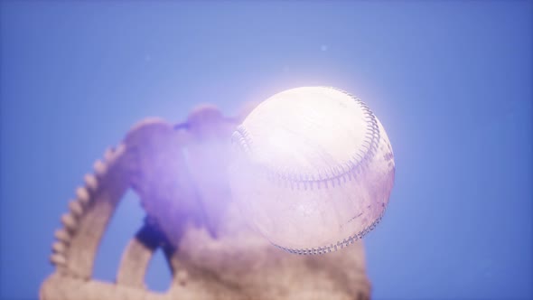 Baseball and Mitt at Blue Sky Background alt