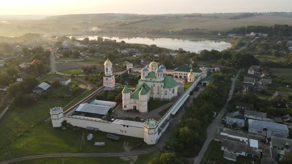 Aerial Shot Village Mezhyrich. Holy Trinity Monastery Of The Upc. Ukraine