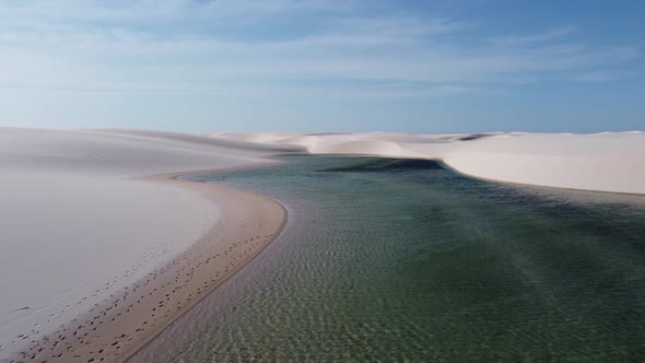 Sand dunes mountains and rain water lagoons at northeast brazilian paradise.