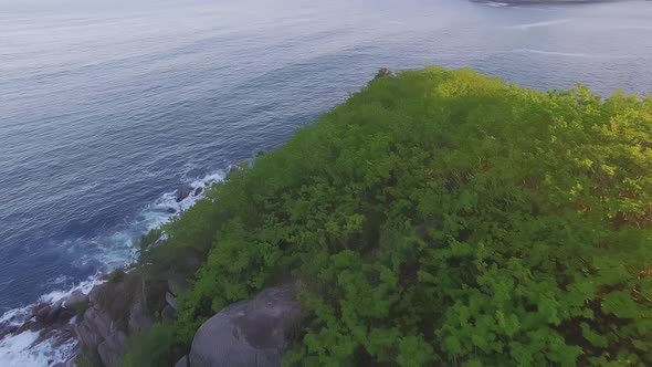 Aerial View of a Beautiful Promontory with Clear Blue Water