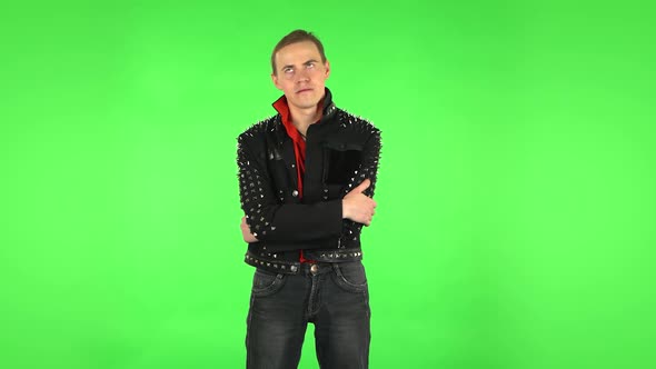 Guy Listens Carefully To Boring Information and Looks Around. Green Screen