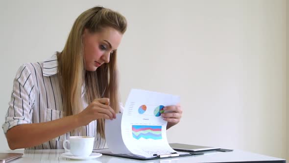 Blonde Business Woman Working at Modern Office