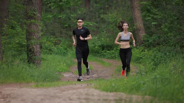 Fitness Couple Running on Nature