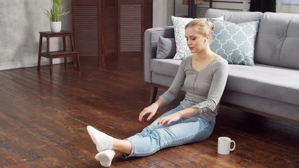 Young woman is resting at home